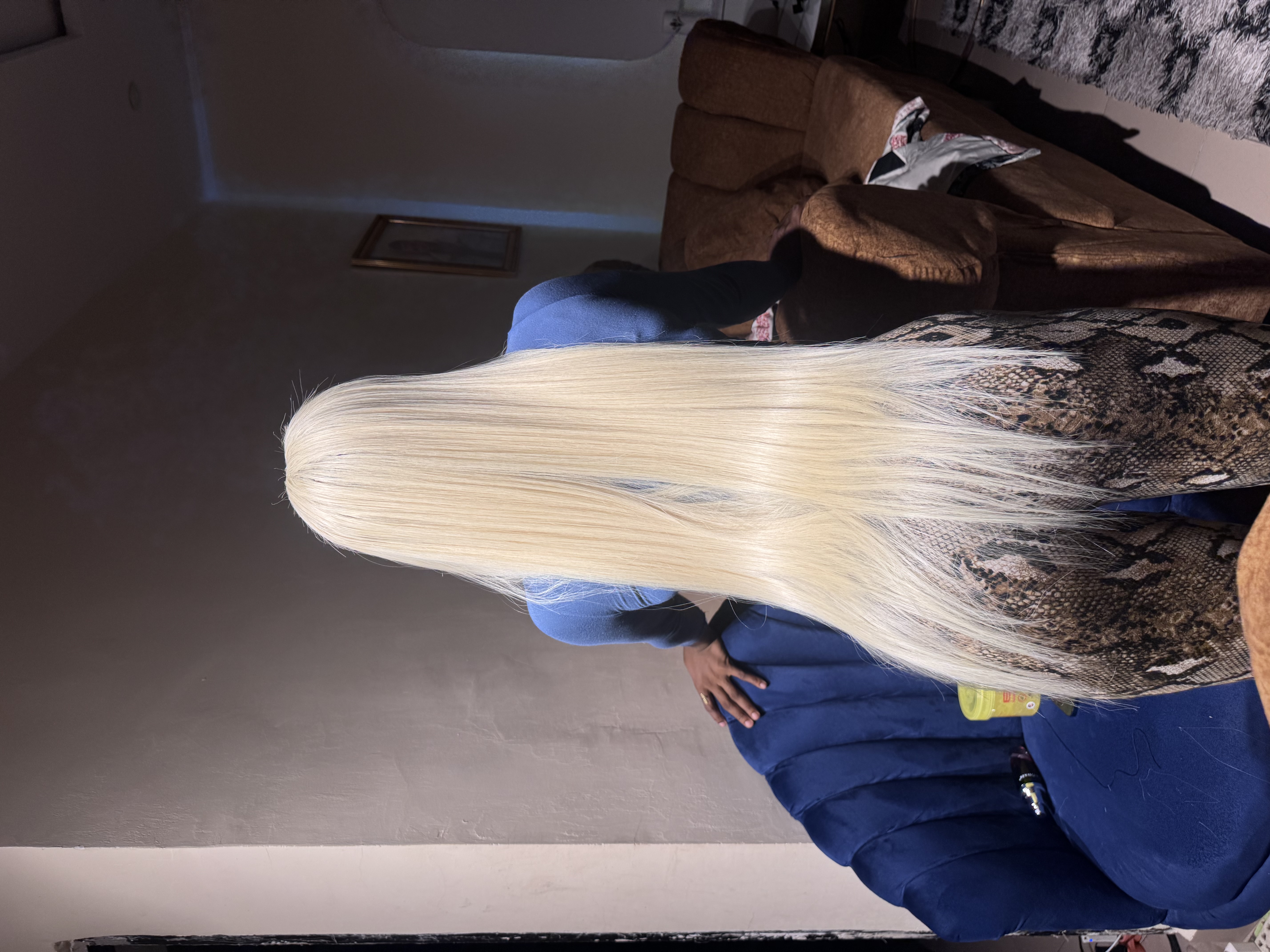 Blonde human hair wig styled and installed by DeLuxury Wigs